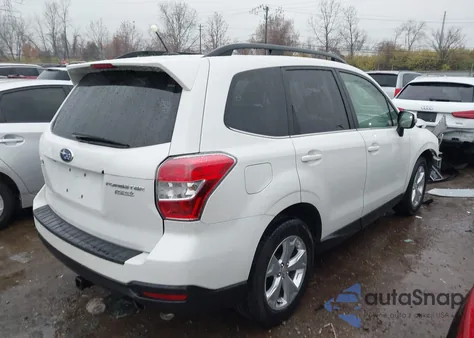 2014 Subaru Forester 2.5I Touring z USA, uszkodzony, nr VIN JF2SJAMC9EH440535